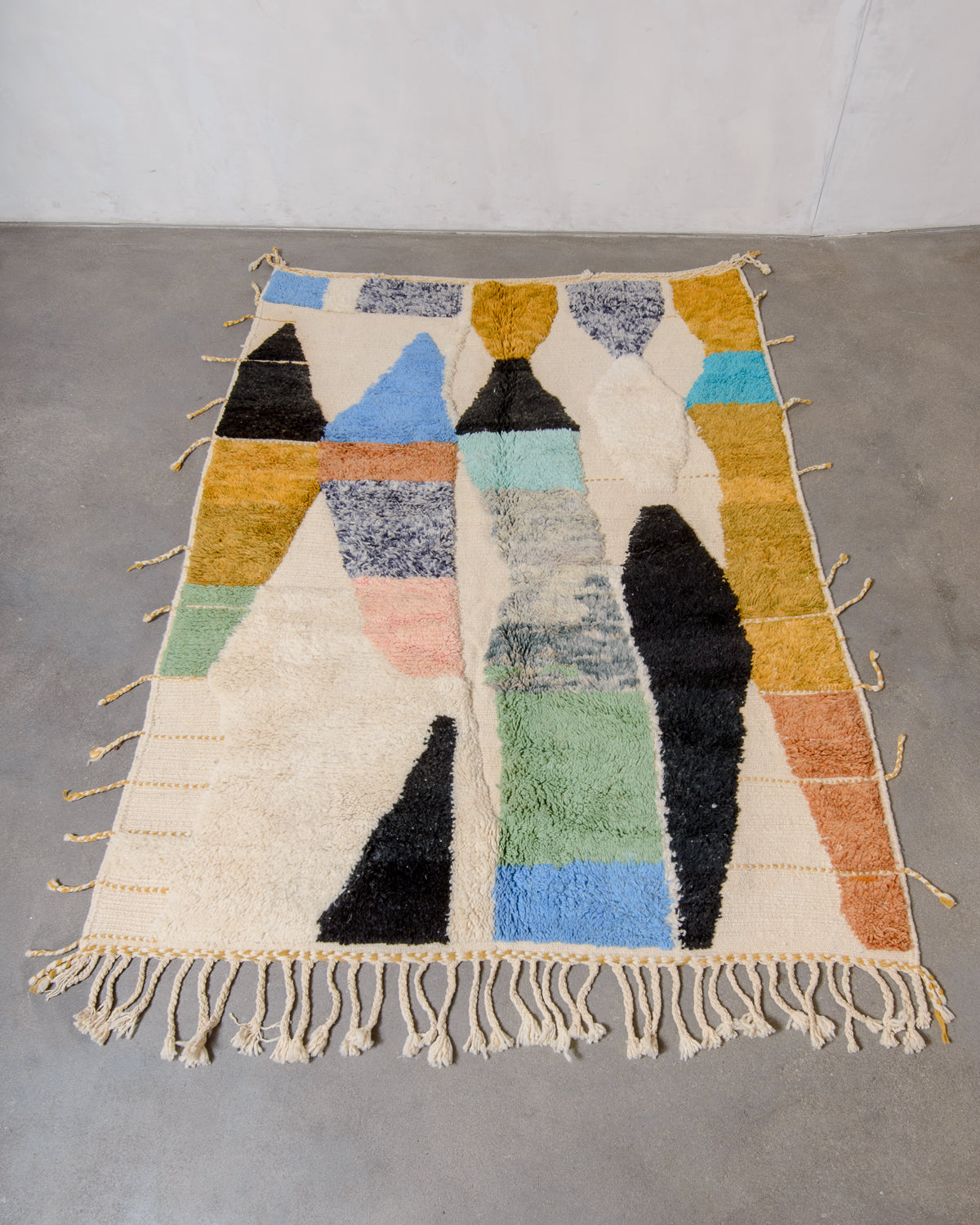 Modern, designer, handcrafted Berber rug from Morocco. Beniourain carpet with beautiful colours and patterns and fluffy wool texture.